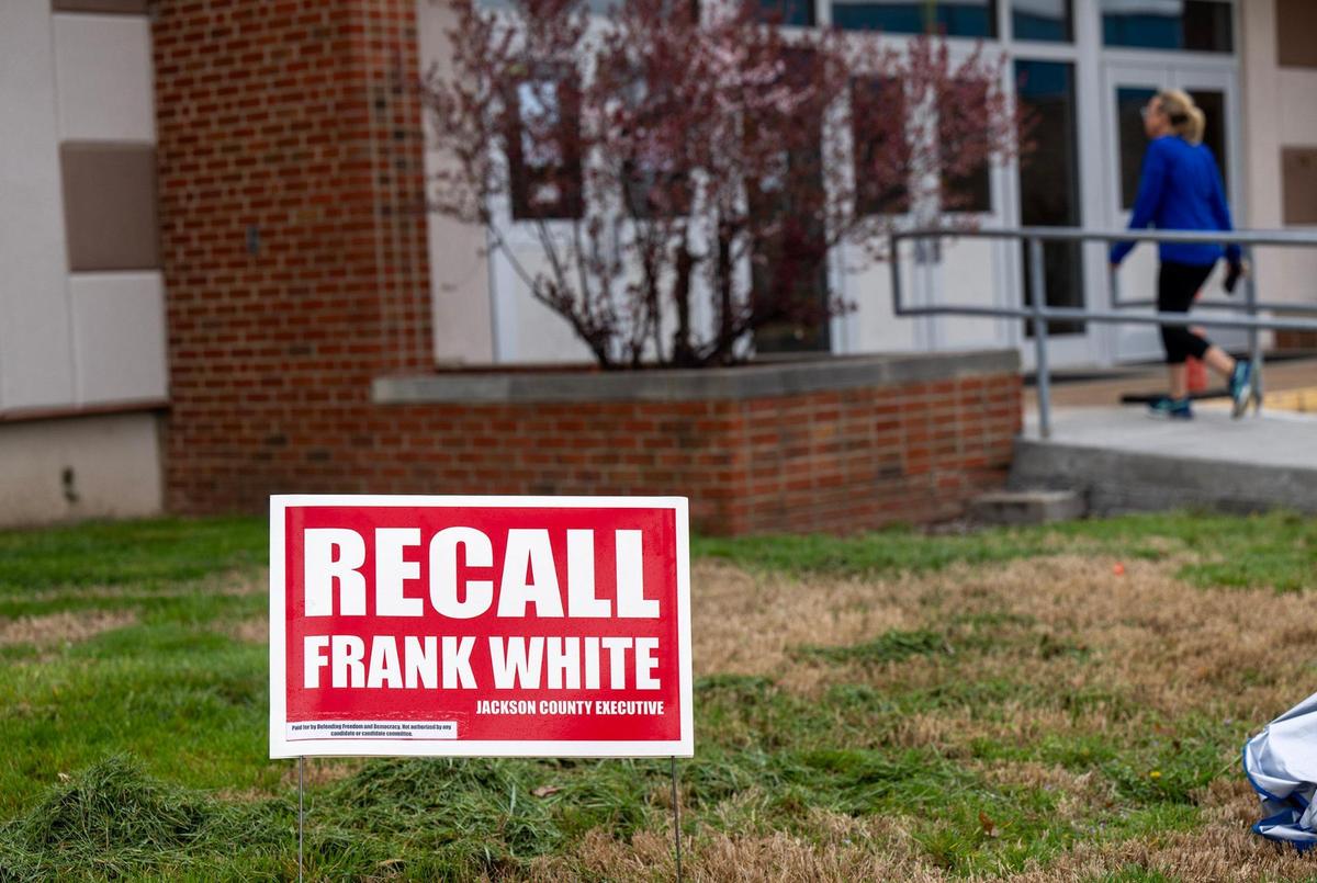 A Recall Frank White sign outside the polling place at Raytown Central Middle School on Tuesday, April 2, 2024. Jackson County voters went to the polls to decide on many races but most notably Question 1, which would authorize tax funding to help pay for a new Royals stadium in the Crossroads and renovations to Arrowhead Stadium.
