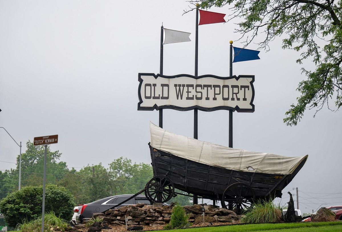 A Conestoga-type wagon that hauled settlers westward has marked the Old Westport Shopping Center since 1963. Now deteriorating, the wagon believed to be from the 1860s is scheduled to be removed and replaced with a replica on May 15.