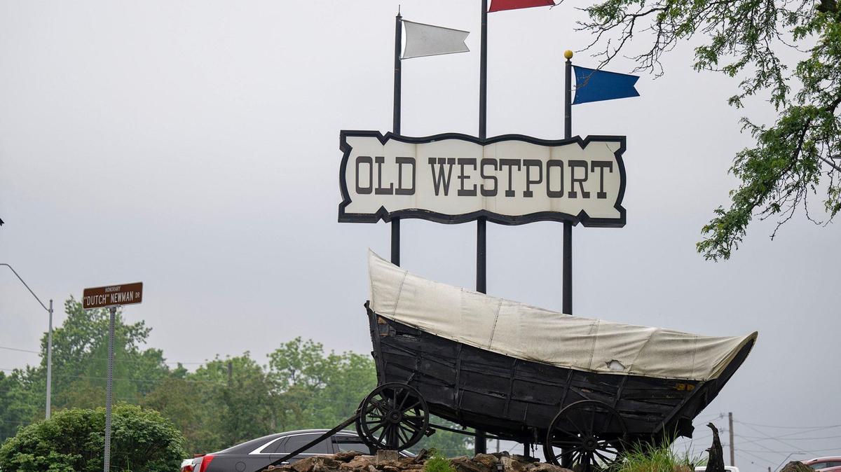 A Conestoga-type wagon that hauled settlers westward has marked the Old Westport Shopping Center since 1963. Now deteriorating, the wagon believed to be from the 1860s is scheduled to be removed and replaced with a replica on May 15.