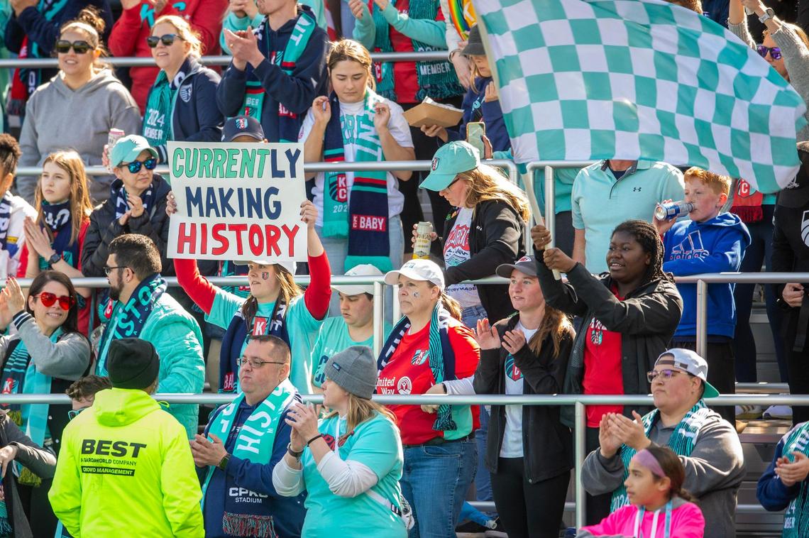 Kansas City Current fans hold a sign celebrating the history of playing in the first stadium built for a women’s professional sports team during the Current’s game with the Portland Thorns FC at CPKC Stadium on Saturday, March 16, 2024, in Kansas City.