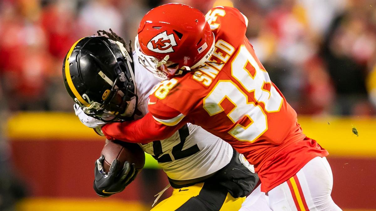 Chiefs cornerback L’Jarius Sneed (38) tackles Steelers running back Najee Harris (22) during the game between the Kansas City Chiefs and the Pittsburgh Steelers on December 26, 2021, at Arrowhead Stadium in Kansas City, Missouri. The Chiefs defeated the Steelers 36-10.