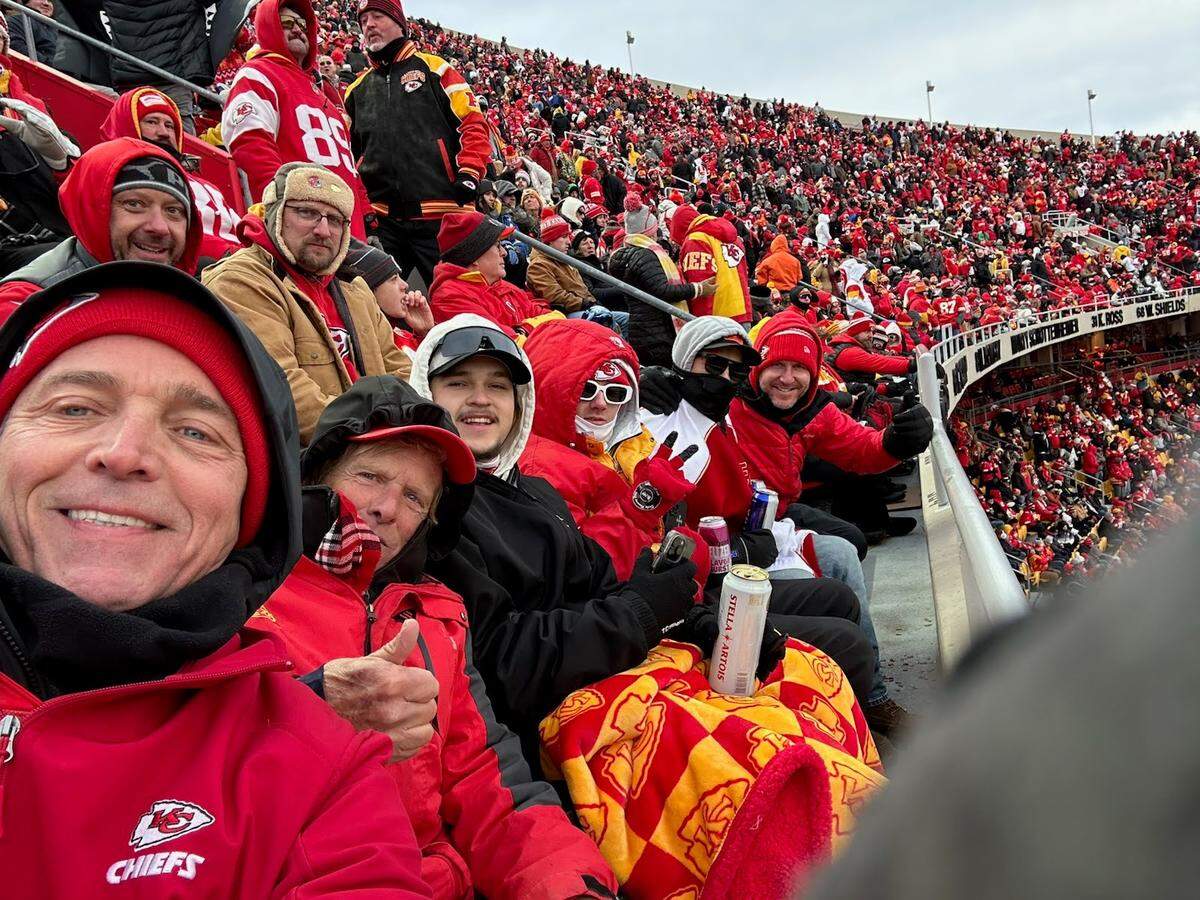 Butch Kueser (second from left) braved the cold with his friends and family to watch the Chiefs beat the Texans in the AFC Divisional game on Jan. 18.
