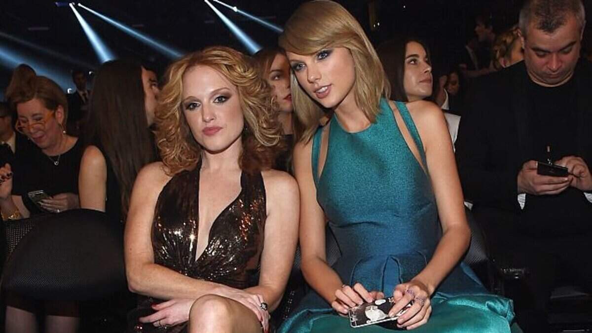 Taylor Swift (R) and Abigail Anderson attend the 57th Annual Grammy Awards at the Staples Center on February 8, 2015 in Los Angeles, California. Anderson, who swam for the University of Kansas, is at the Swift-Kelce wedding celebration in New York City.