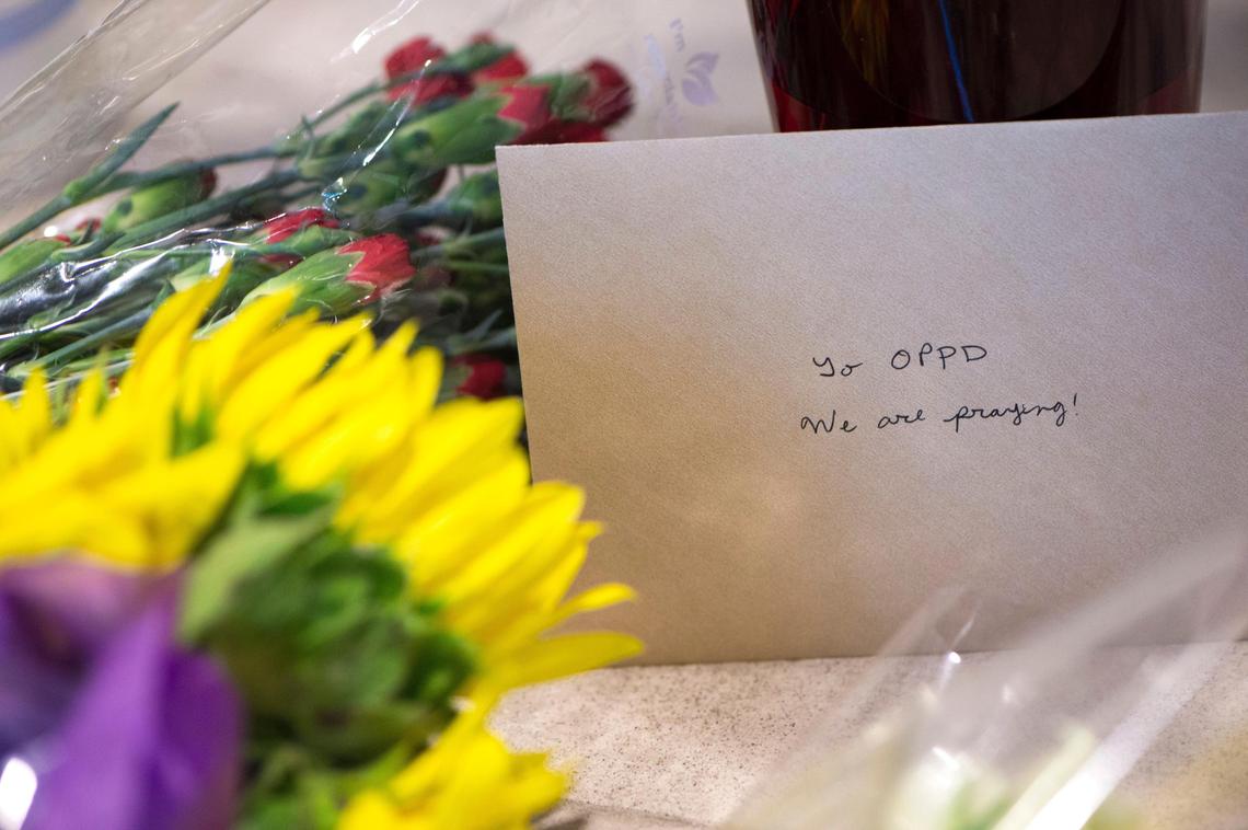Flowers were placed inside the Overland Park police station, 12400 Foster St., after Officer Mike Mosher was killed in a shoot out with an armed suspect near W. 123rd and Mackey streets on May 3, 2020 in Overland Park. Mosher was also was the current president of the Overland Park Fraternal Order of Police. It was the first time an officer was killed in the city in more than three decades, according to police.