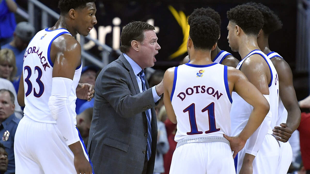 Kansas coach Bill Self instructs his team during a break in the action during the first half of Friday night’s Big 12 Tournament semifinal game at the Sprint Center.