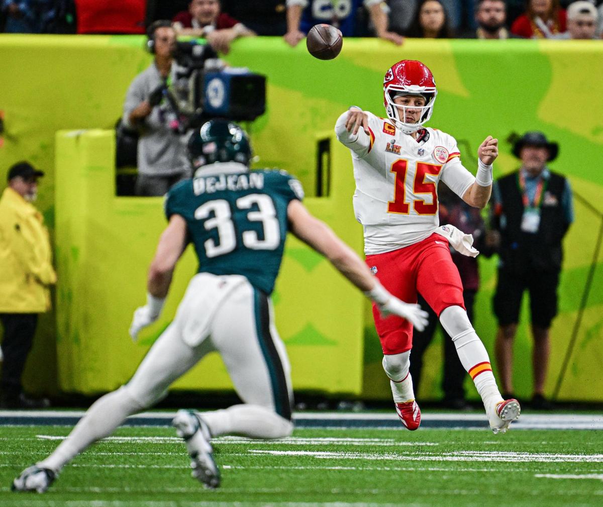 Philadelphia Eagles cornerback Cooper DeJean (33) gets into position to intercept a second quarter pass by Kansas City Chiefs quarterback Patrick Mahomes (15) and run it in for a touchdown during Super Bowl LIX on Sunday, Feb. 9, 2025, in New Orleans.
