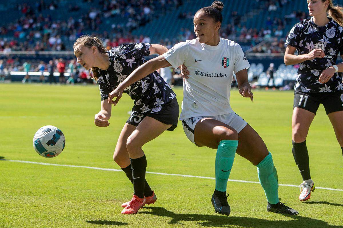 Current forward Elyse Bennett (No. 23) attempts to track down the ball during KC’s April 2 home opener against Racing Louisville at Children’s Mercy Park in Kansas City, Kan.