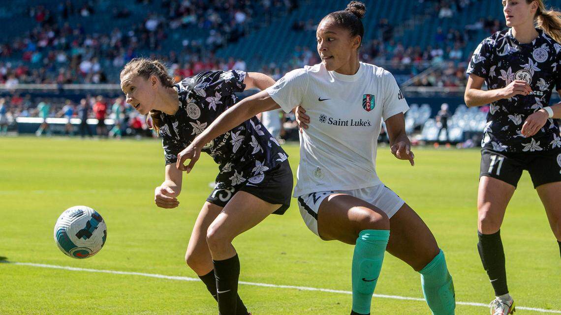 KC Current forward Elyse Bennett (No. 23) attempts to track down the ball during Saturday’s home opener between the Current and Racing Louisville at Children’s Mercy Park in Kansas City, Kan.