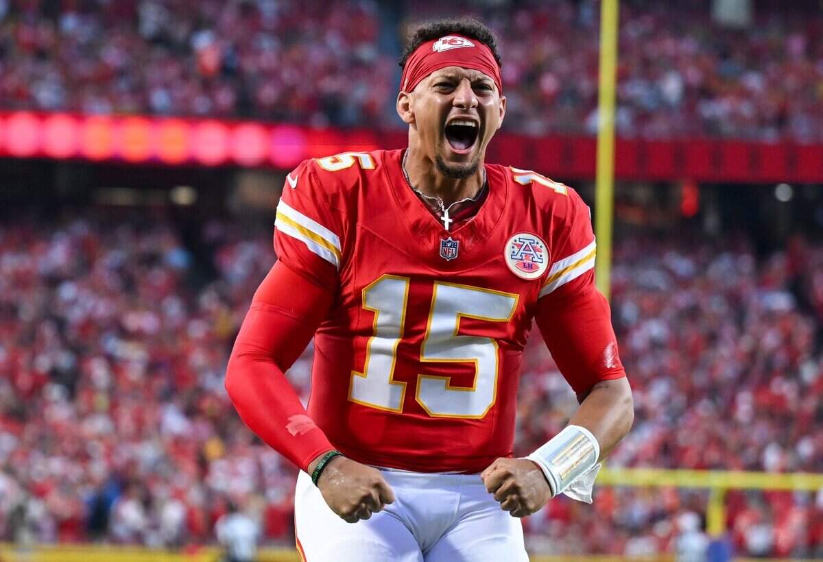 Kansas City Chiefs quarterback Patrick Mahomes (15) celebrates after scoring a touchdown in the first quarter of the Kansas City Chiefs vs. Denver Broncos NFL season opener at Arrowhead Stadium in Kansas City on Sept. 14, 2026.