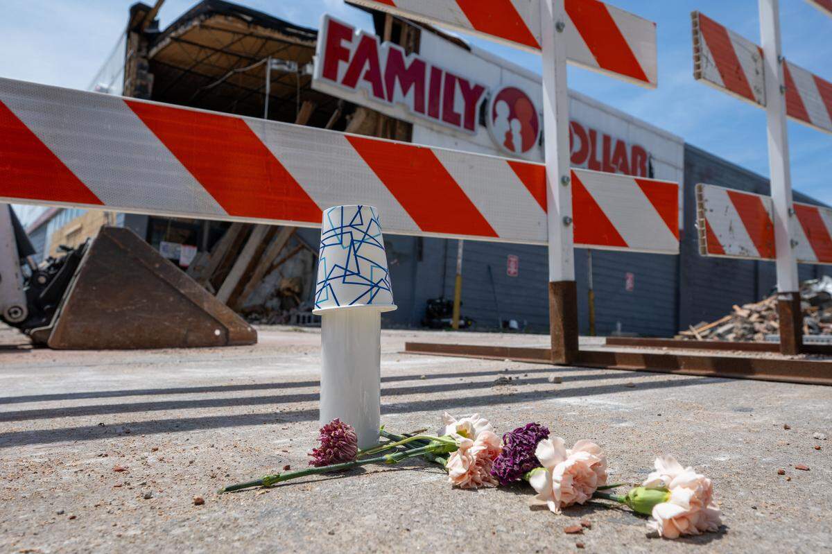A memorial for the man that died at Family Dollar on the 3700 block of Broadway in Kansas City, Monday, July 28, 2025, after a portion of the building collapsed the previous day.