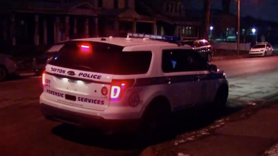 Police are investigating after they say a 4-month-old girl was found unconscious with a dog lying on top of her in a Dayton, Ohio, home.