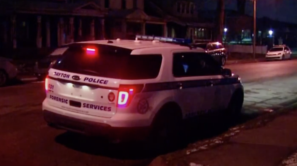 Police are investigating after they say a 4-month-old girl was found unconscious with a dog lying on top of her in a Dayton, Ohio, home.