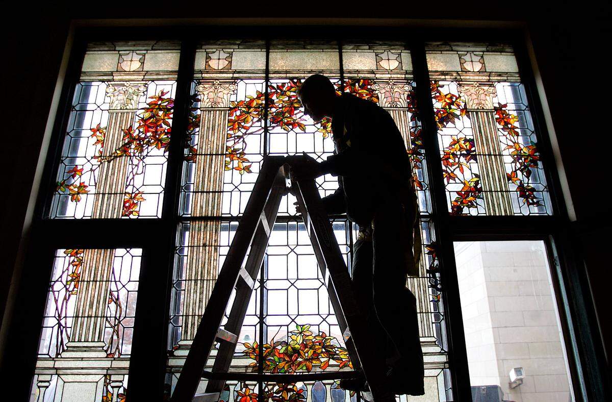 During renovations in 2008, Aaron Jaben of Uroglass Designs worked on stained glass windows in Corinthian Hall.