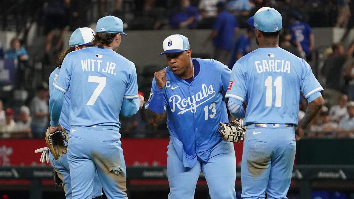 Kansas City first baseman Salvador Perez (center) leads his team’s postgame celebration after a road win against the Rangers on June 18, 2025 at Globe Life Field in Arlington, Texas.