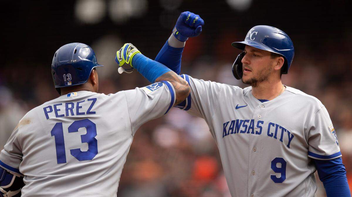 Royals catcher Salvador Perez (left) gets congratulations from teammate Vinnie Pasquantino after hitting a solo home run against the San Francisco Giants at Oracle Park on April 7, 2023. Both Pasquantino and Perez homered in the win.