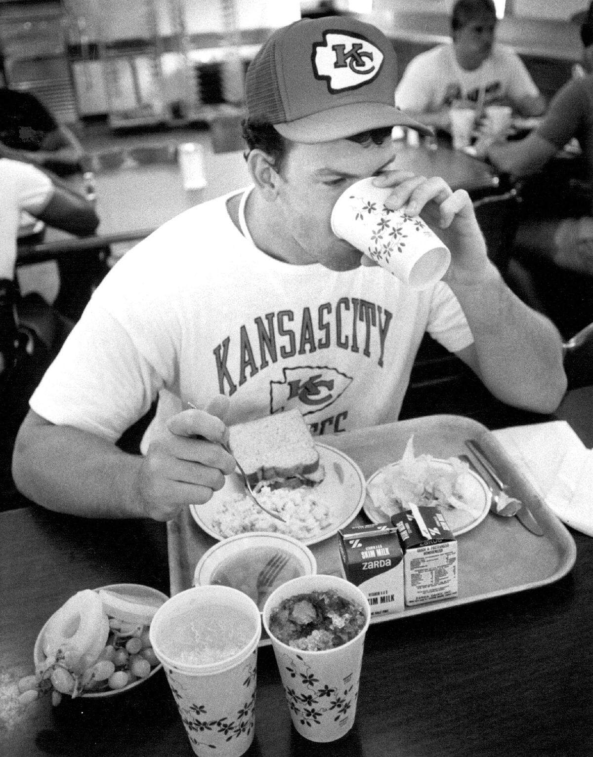 An unidentified Chiefs player needs plenty of food for training camp in an undated photo.