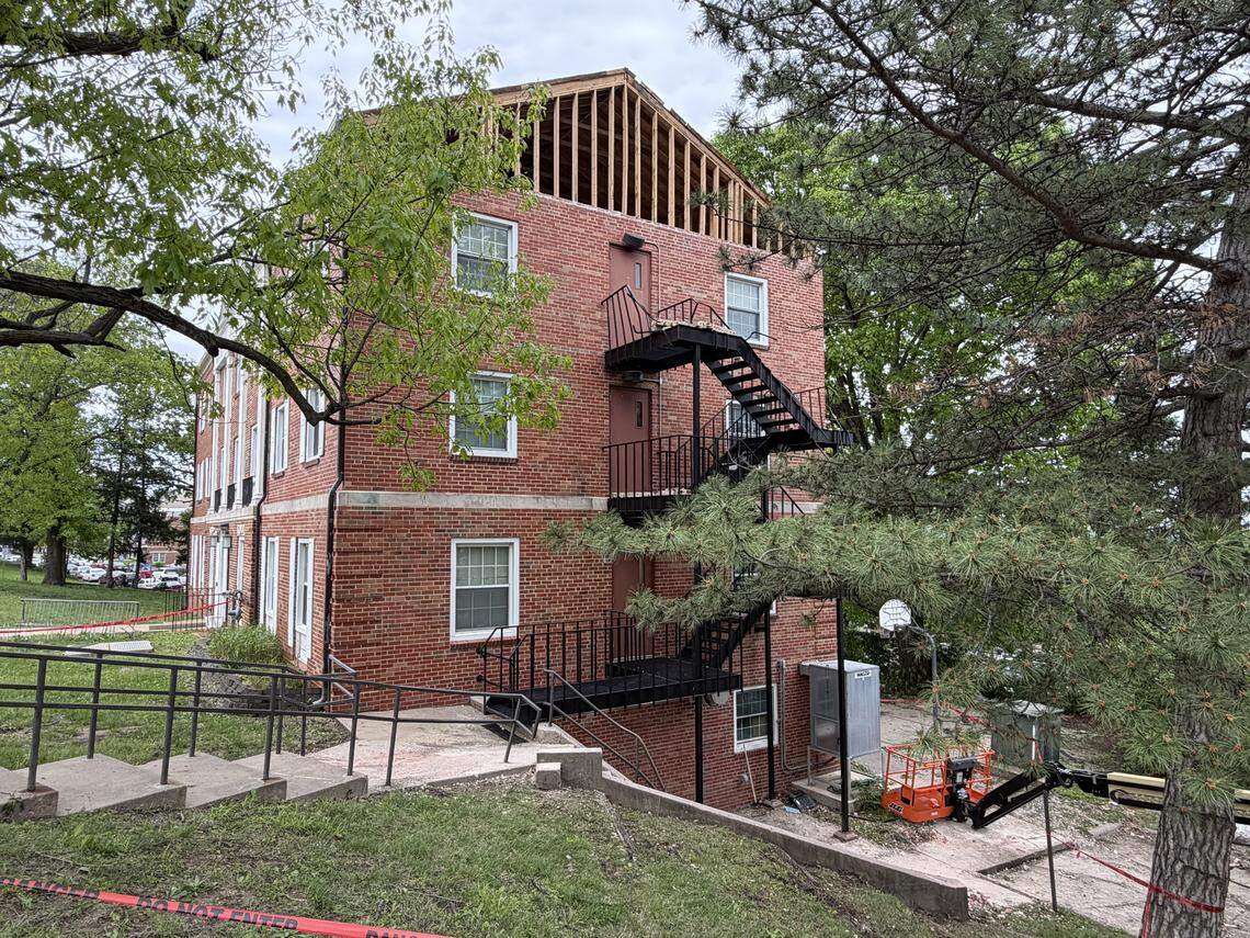 An entire section of bricks beneath the gable roof on the south side of Stephenson Scholarship Hall was dislodged in a storm early Monday morning, damaging the railing on a fire escape and rendering it inaccessible.