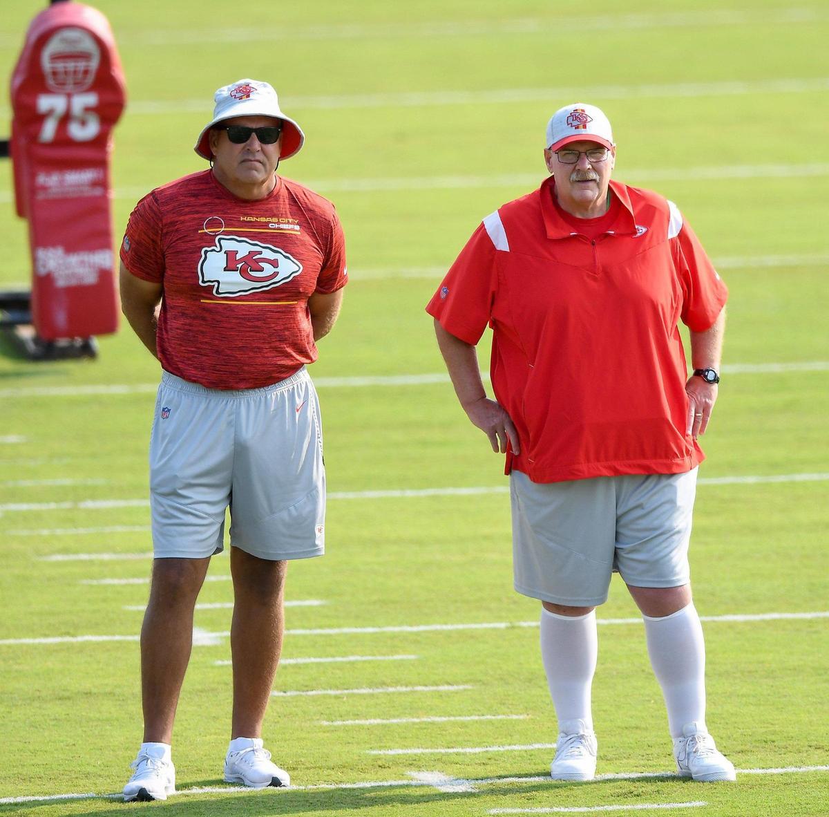 Kansas City Chiefs assistant head coach and special teams coordinator Dave Toub, left, and head coach Andy Reid watch drills during the Kansas City Chiefs training camp at Missouri Western State University in St. Joseph Tuesday, Aug. 3, 2021.