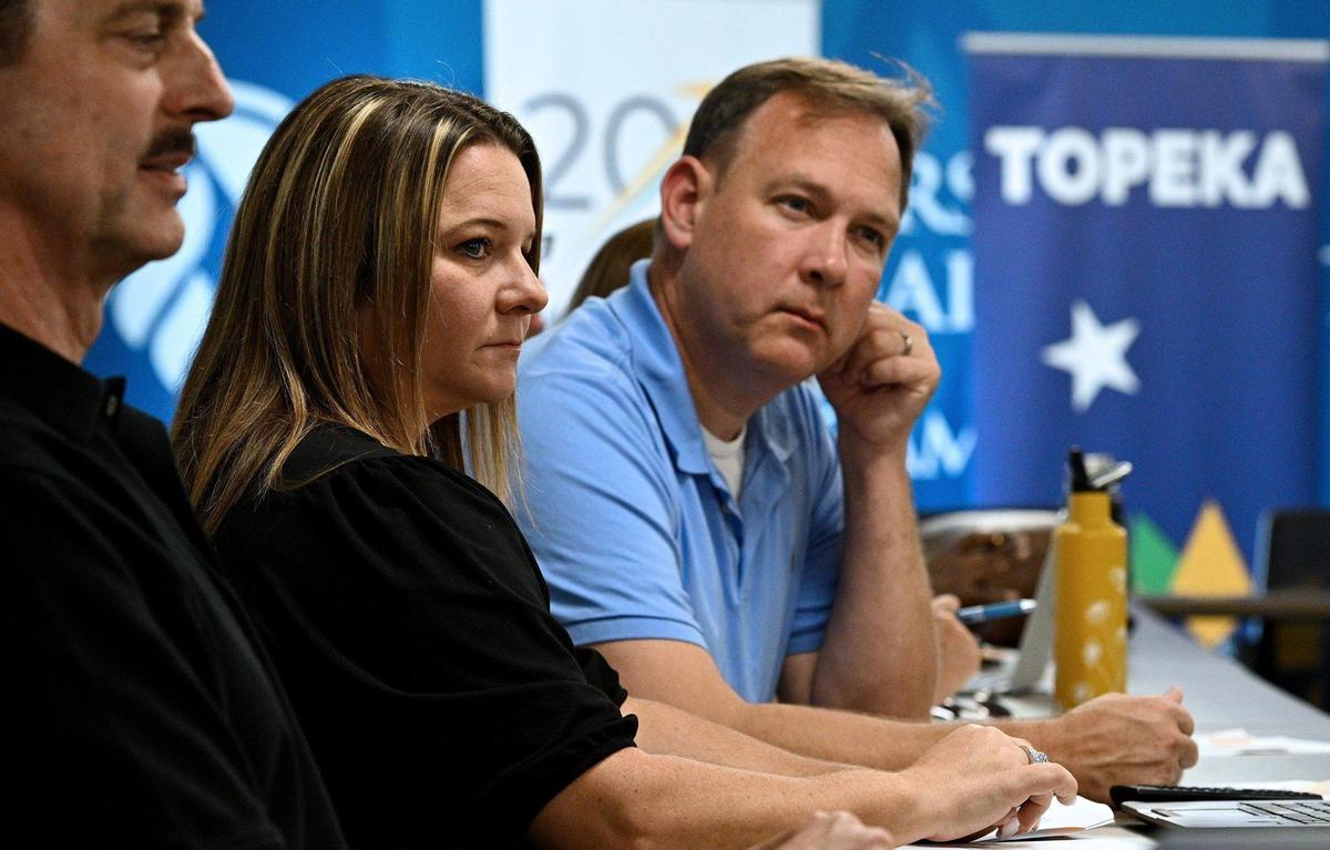 Trina Goss, director of the Choose Topeka program, left, and Bob Ross, senior vice president of communications for the Greater Topeka Partnership, at a June community meeting about the increasing need for housing in Topeka.
