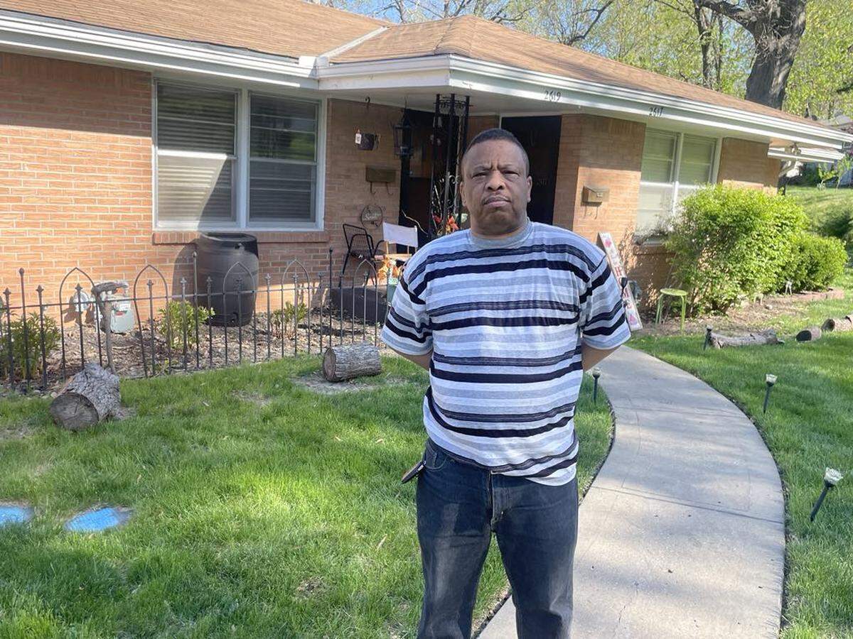 Kansas City, Kansas, resident Robert Ewing stands outside his home of 33 years. Like many Kansans, he’s struggling to keep up with his ever-climbing property tax bill.