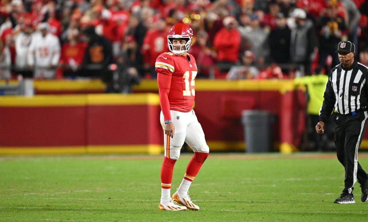 Kansas City Chiefs quarterback Patrick Mahomes (15) walks off the field after being intercepted by the Washington Commanders for the second time in the first half on Monday, Oct. 27, 2025, at GEHA Field at Arrowhead Stadium.