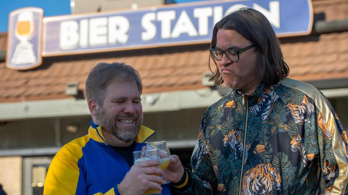 Owner John Couture, left, and friend and investor Dan Kiefer celebrate the last day of Bier Station.