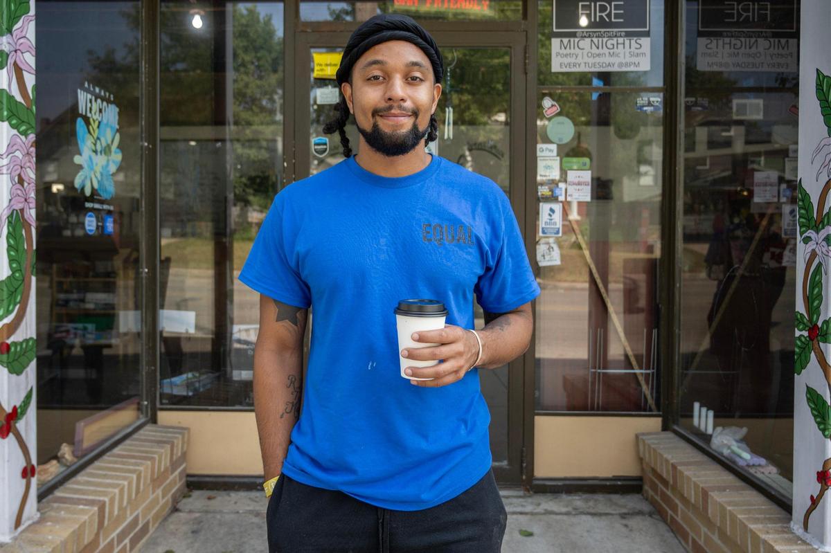 Dontavious Young, owner of Equal Minded Cafe, is seen outside the cafe in Kansas City.