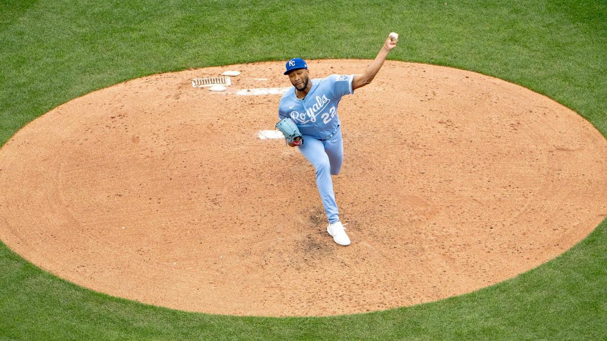 Kansas City Royals relief pitcher Amir Garrett (22) throws a pitch against the Minnesota Twins during an opening day baseball game at Kauffman Stadium, Thursday, March 30, 2023, in Kansas City.