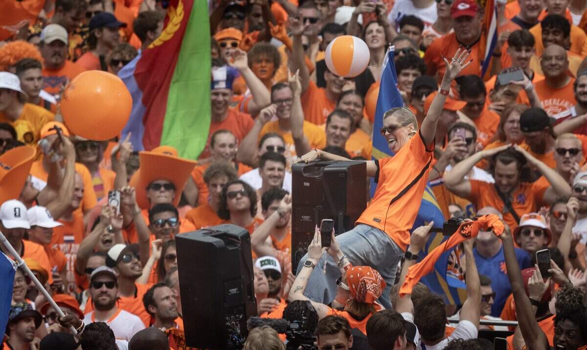 Netherlands soccer fans party at the intersection of Grand and Pershing in downtown Kansas City on Thursday, June 25, 2026.