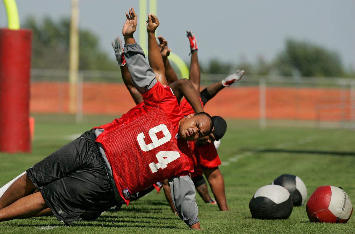 Junior working out in the sweltering summer heat at Chiefs training camp in 2006. He was cut from the team the following month.