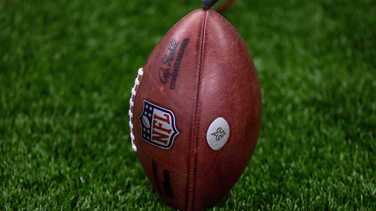Aug 13, 2023; New Orleans, Louisiana, USA; A detail view of a New Orleans Saints football on the field during a time out against the Kansas City Chiefs during the second half at the Caesars Superdome. Mandatory Credit: Stephen Lew-USA TODAY Sports