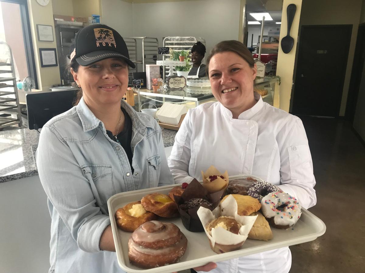 Penny Romero, left, and Brittany Brittin, with some of their offerings.