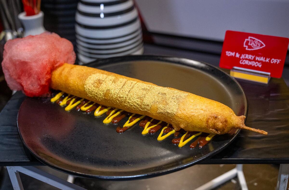 The Tom & Jerry’s Walk Off Corndog features a bacon wrapped brisket dog skewer with sweet and spicy cream cheese, battered and fried then topped with spicy cotton candy.