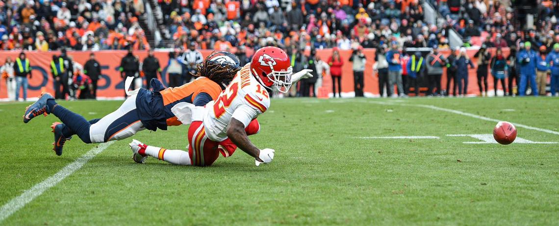 Kansas City Chiefs wide receiver Mecole Hardman Jr. (12) fumbles a punt return in the fourth quarter against Denver Broncos Sunday, October 29, 2023, at Mile High Stadium in Denver.