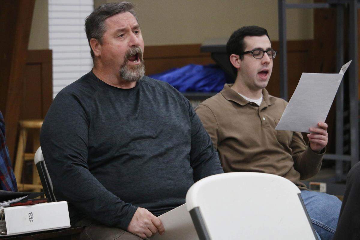 Greg Toplikar and Scott Dubrow sing ‘Go Down Moses’ during a Trails West Chorus rehearsal.
