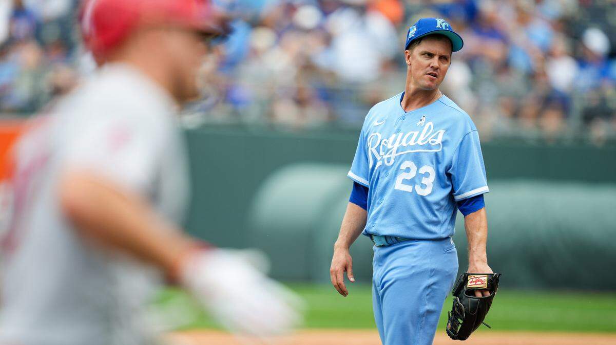 Royals pitcher Zack Greinke winces after giving up a home run to Los Angeles Angels center fielder Mike Trout during the fifth inning of Sunday’s game at Kauffman Stadium.