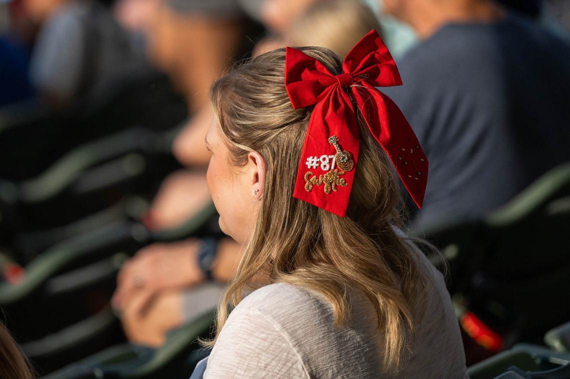 A hair bow on a fan attending Saturday night’s Monarchs game at the Legends sports a nod to Taylor Swift and Travis Kelce.