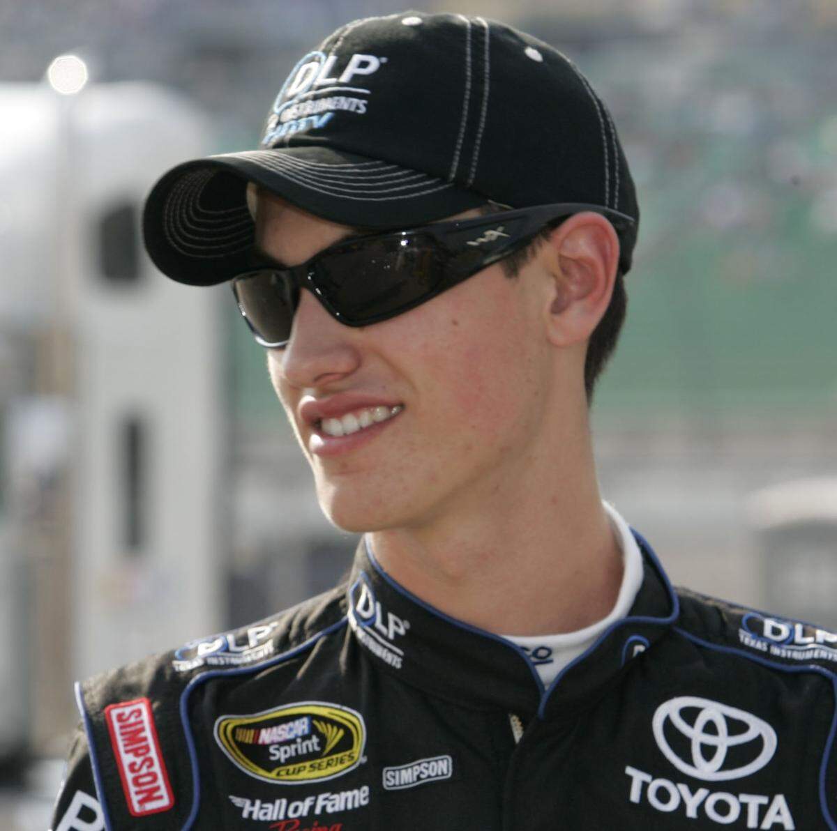 Wearing the dark shades, Joey Logano talks racing at Kansas Speedway.