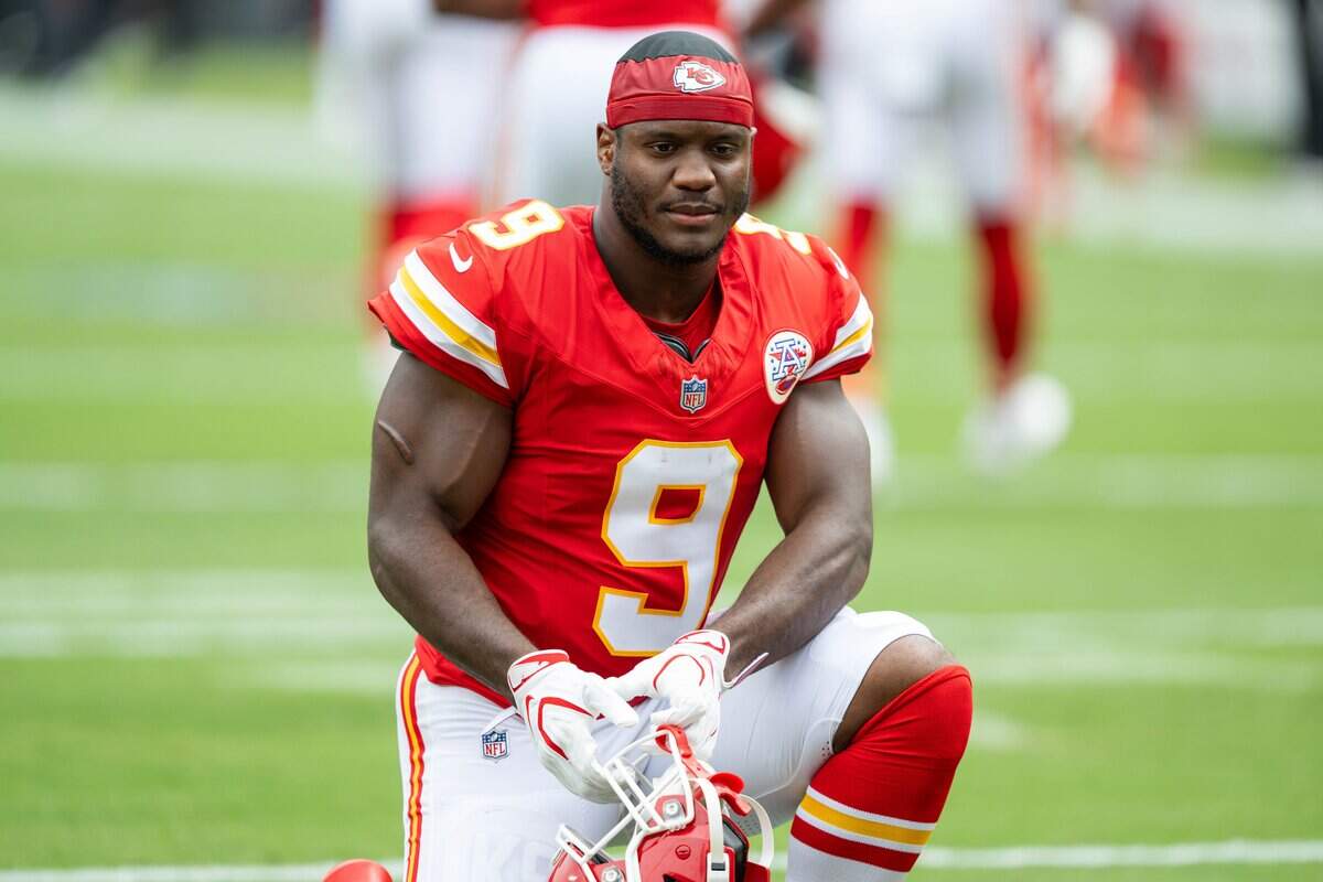 Kansas City Chiefs running back Kansas City Chiefs running back Kenneth Walker III (9) kneels before the Chiefs preseason game against the Los Angeles Rams, on Saturday, August 15, 2026, at Arrowhead Stadium.