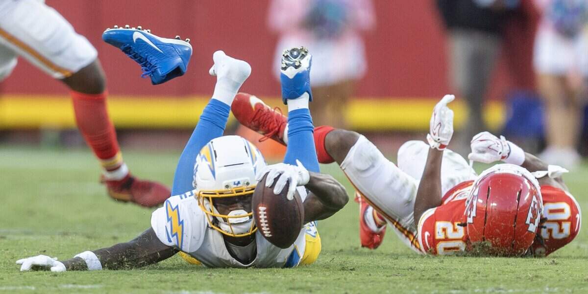 Los Angeles Chargers wide receiver Keandre Lambert-Smith (84) loses a shoe and fails to convert a critical fourth down during the second half against the Chiefs on Sunday at Arrowhead Stadium.