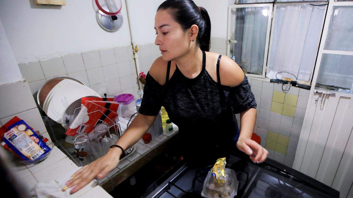A woman cleaning.