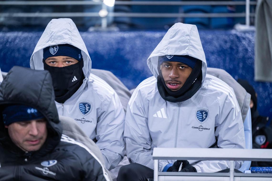 Sporting KC players Zorhan Bassong and Alenis Vargas attempt to stay warm in subzero conditions at the Concacaf Champions Cup match of Sporting KC vs. Inter Miami CF on Wednesday, Feb. 19, 2025, at Children’s Mercy Park.