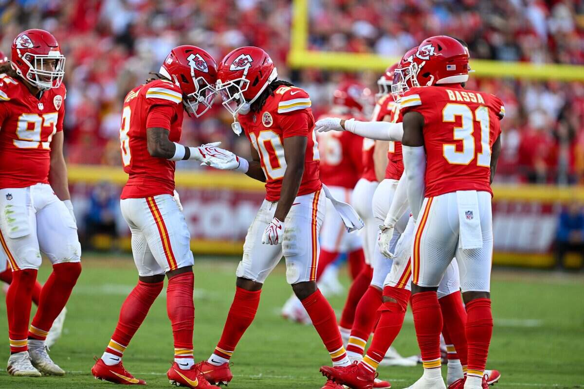 Kansas City Chiefs cornerback Nohl Williams (20) celebrates with teammates in the second half of the Kansas City Chiefs vs. Los Angeles Chargers NFL regular season game at Arrowhead Stadium in Kansas City on Oct. 18, 2026.