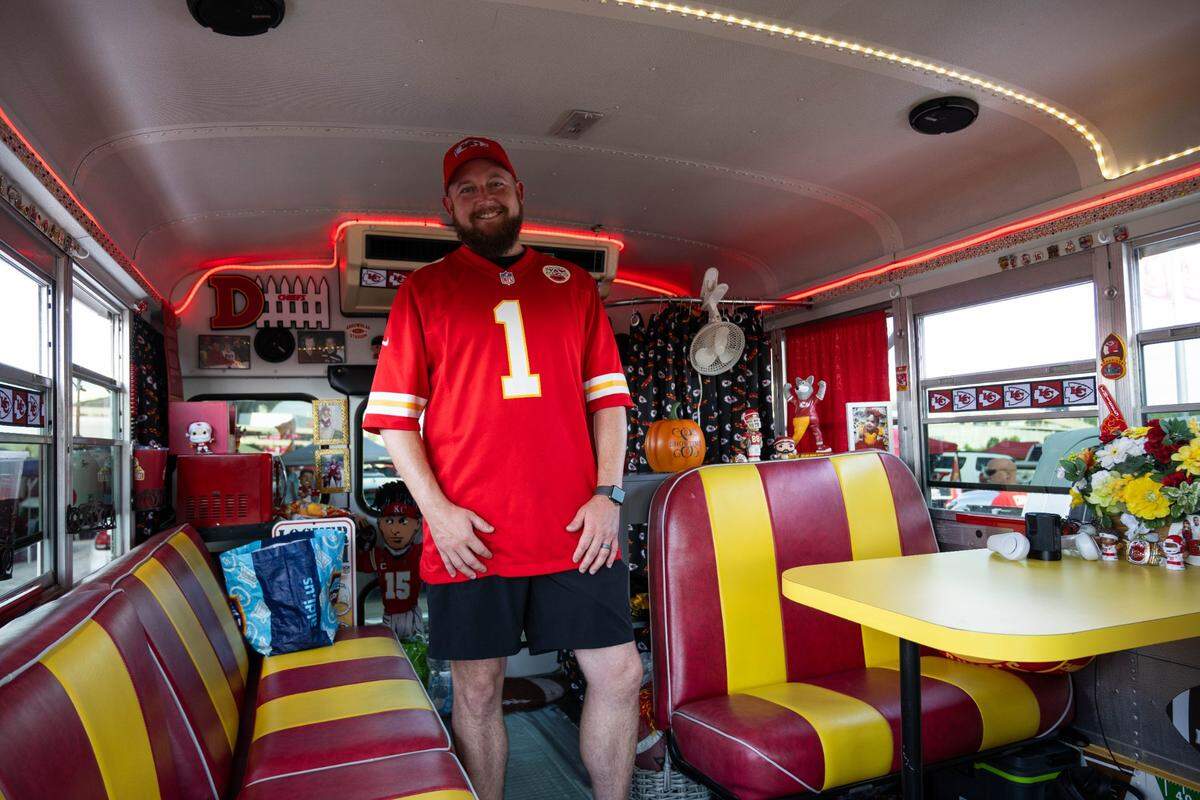 Tim Squires from Independence stood in his decked out Chiefs bus his family regularly uses for tailgating. Squires was at the Kansas City Chiefs’ game with the Cincinnati Bengals on Sept. 15, 2024, at Arrowhead Stadium.