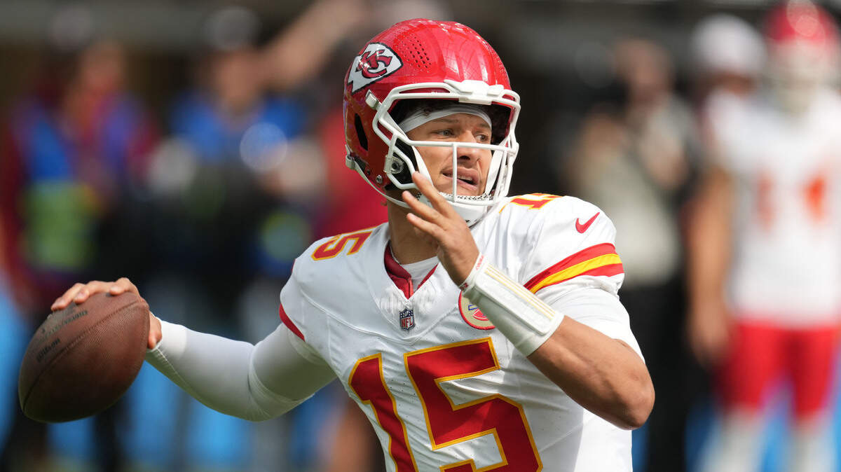 Kansas City Chiefs quarterback Patrick Mahomes (15) throws the ball in the first quarter against the Los Angeles Chargers at SoFi Stadium.