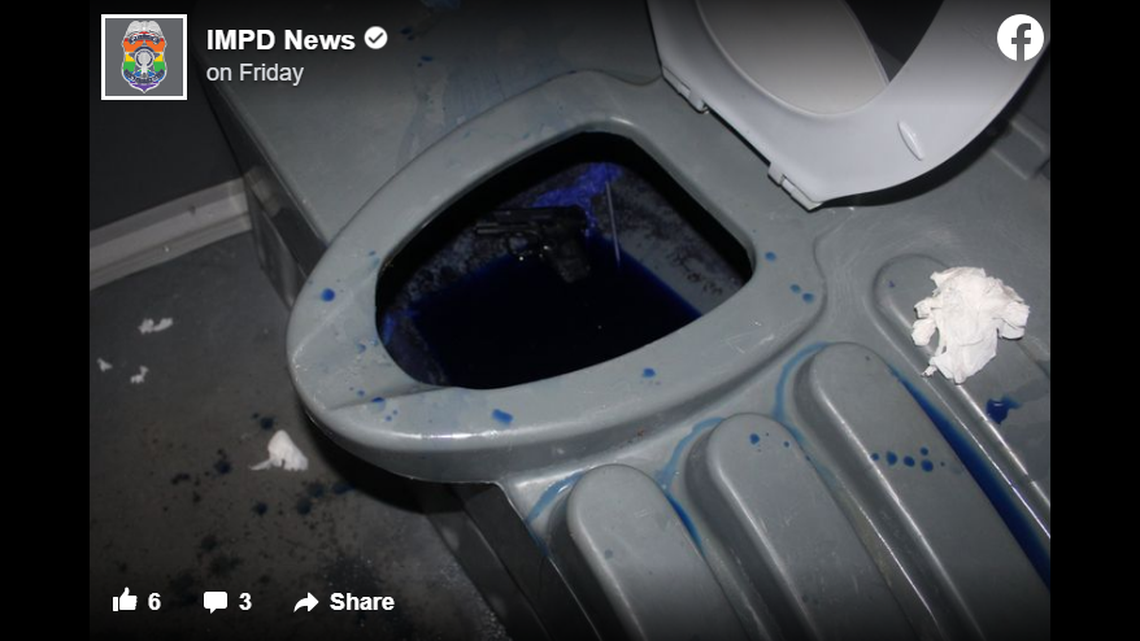 Police say the suspects tried to hide two handguns in the toilet.