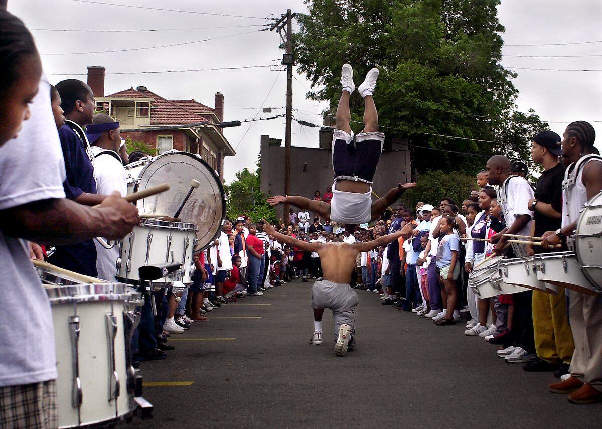 The Marching Cobras held an alumni event in 2003 at 34th Street and the Paseo. These alumni showed that they sill had sharp moves.