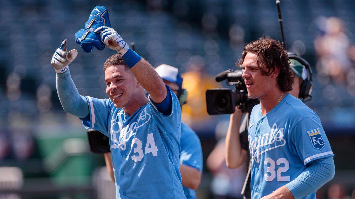 Kansas City Royals catcher Freddy Fermin (34) motions to the crowd after a walk-off hit in the 10th inning against the Cleveland Guardians at Kauffman Stadium on June 29, 2023.