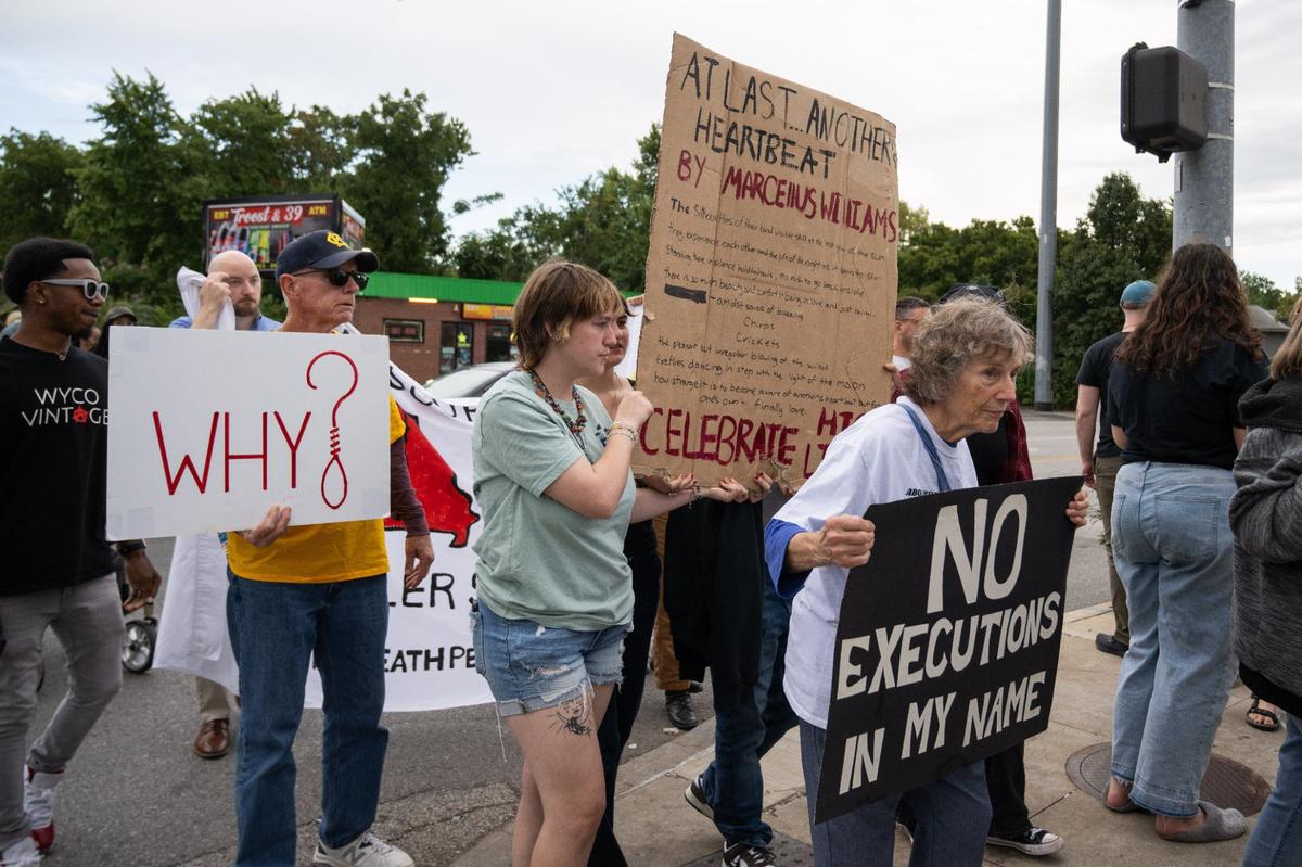 Protestors gathered at the corner of 39th and Troost in Kansas City on Tuesday, Sept. 24, 2024 to protest the execution of Marcellus Williams. Williams was executed Tuesday evening after a final push for a stay was denied by the Supreme Court.