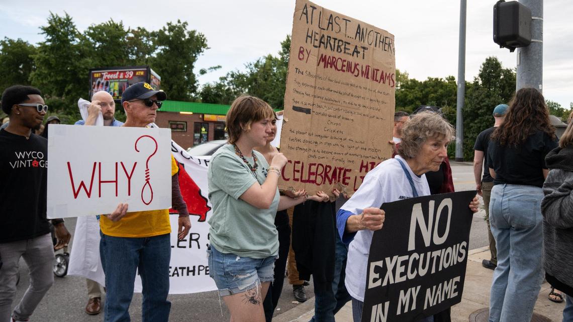 Protestors gathered at the corner of 39th and Troost in Kansas City on Tuesday, Sept. 24, 2024 to protest the execution of Marcellus Williams.